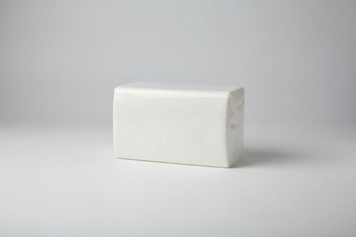 Large roll of white paper towels on a table